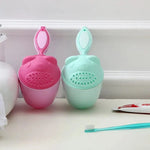 Load image into Gallery viewer, Becmella tear free baby rinse cup set in pink and mint with bear face design and hanging loop on bathroom counter
