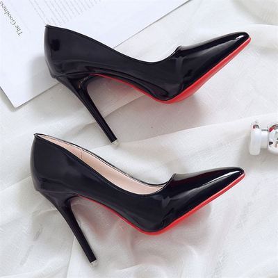 Becmella black high heel red bottom pumps for women with a glossy finish on a white fabric background